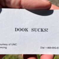 Coach writes apology letter #2 for “Duke Sucks” business cards