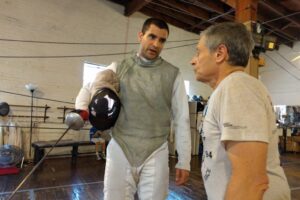 Coach John Page, foil fencing bout