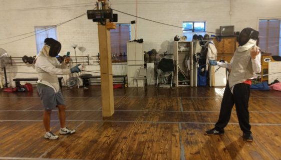 fencer on cell phone